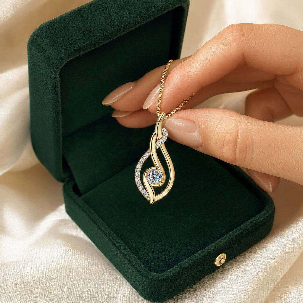 Diya Al Nur Pendant presented in an plum velvet gift box