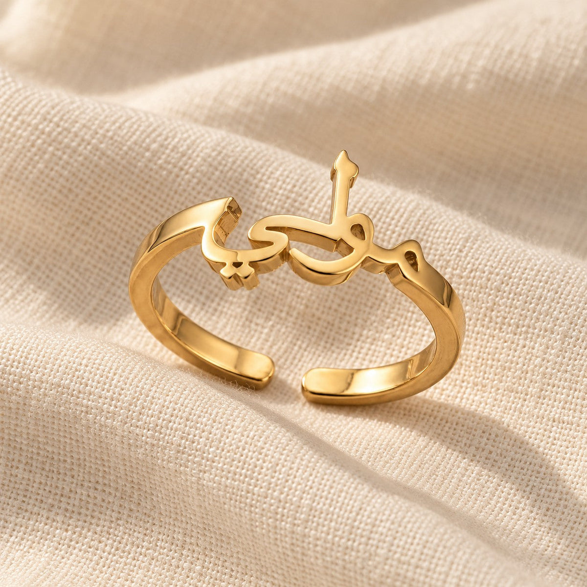 Arabic Custom Name Ring on cream linen