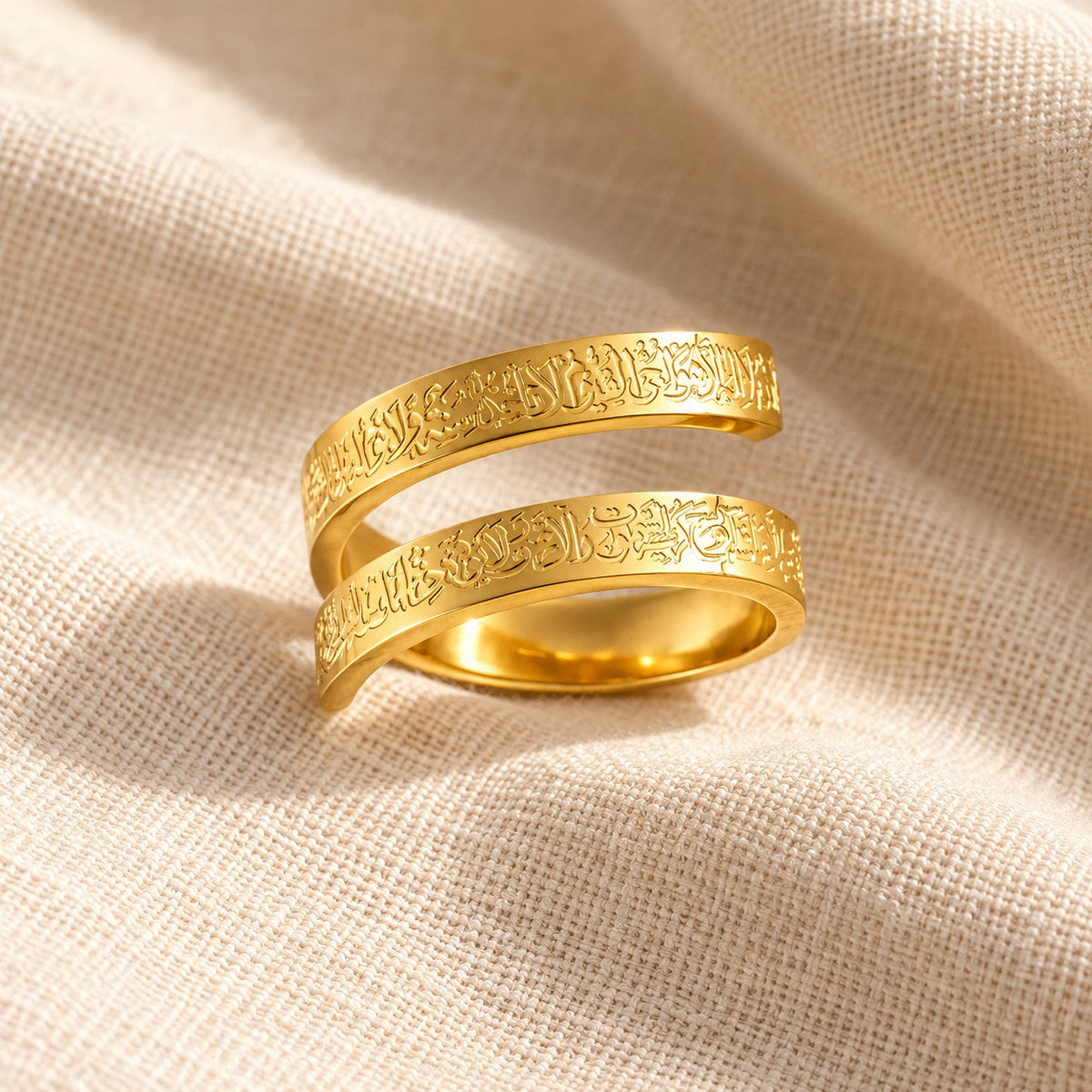 Ayatul Kursi Spiral Ring on cream linen