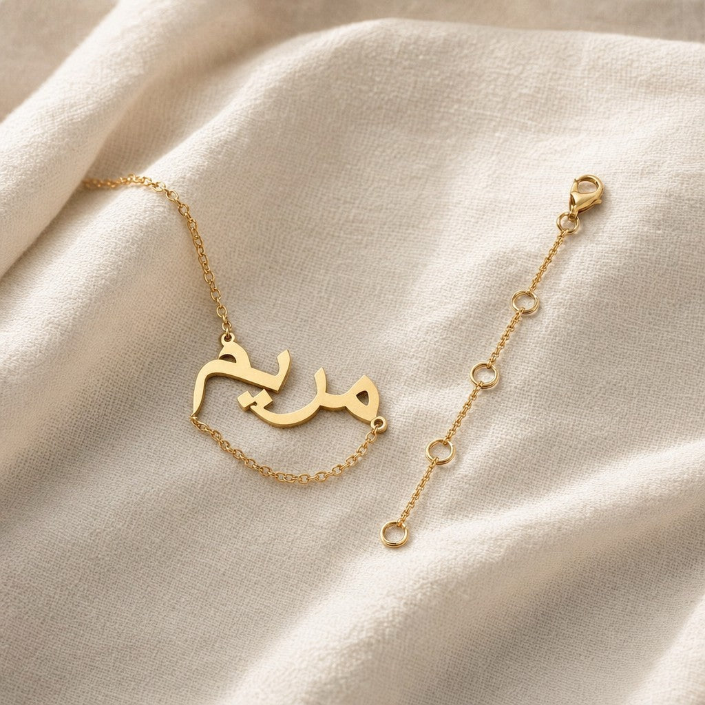 Plum Gift Box + Gold Chain Extender on cream linen