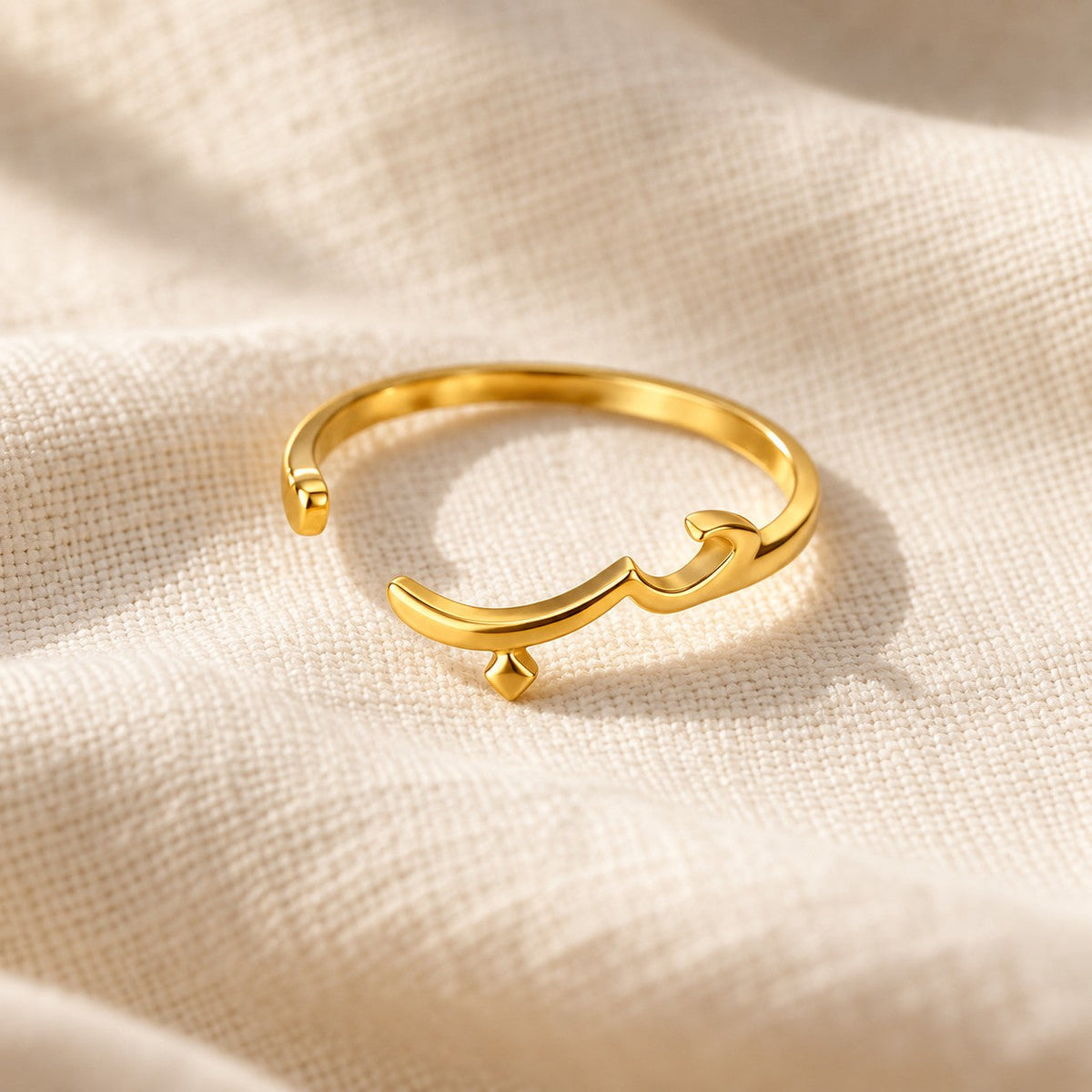 Arabic Love Ring on cream linen