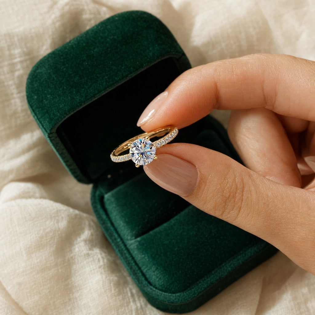 Solitaire Ring presented in an plum velvet gift box